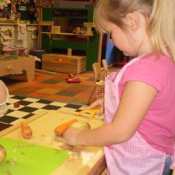 Children preparing vegetables