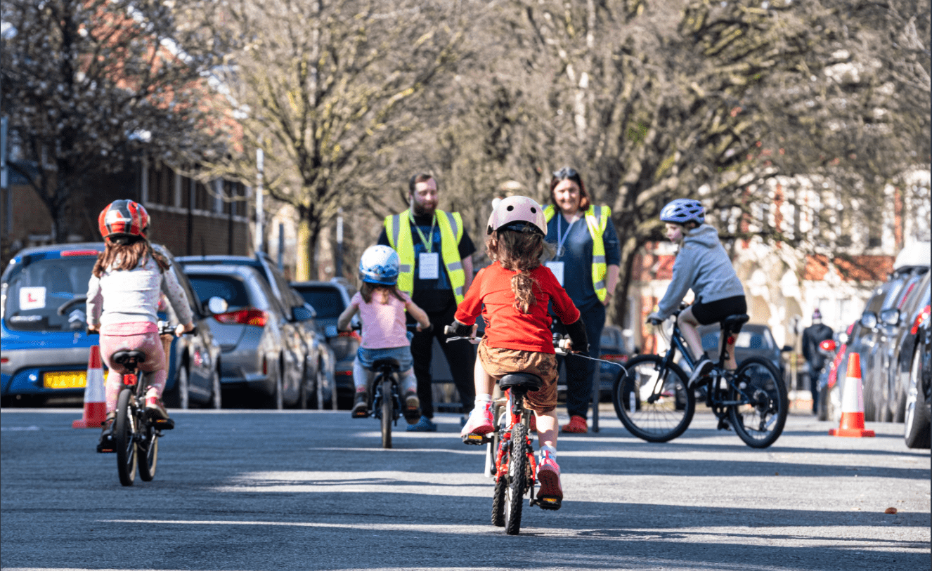 Children cycling in the street