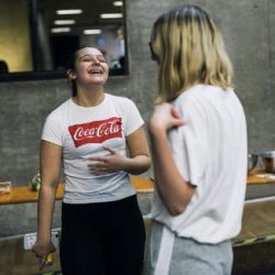 Photo of two young people talking